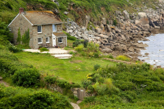 A stone house is seen on Lamorna Cove, Cornwall. Lamorna Cove is the town where the British Actor Robert Newton grewup. His father Algernon Newton was a British landscape painter. (Photograph by Kim Newton)