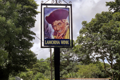 The Lamorna Wink pub sign depicting Kim Newton's father the British actor Robert Newton as Long John Silver in Walt Disney's Treasure Island. Robert Newton grew up in Lamorna Cove up the road from the pub. (Photograph by Kim Newton)