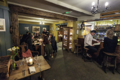 Visitors to the Gurnard's Head Inn enjoy a meal and drinks. Located between St. Ives and St. Just the pub was a favorite of British spy novelist David Cornwell. (Photograph by Kim Newton)