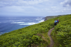 Hikers walk along the coastal path near Zennor, Cornwall, England. (Photograph by Kim Newton)