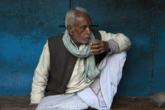 A man sips chai on the streets of Varanasi, India.