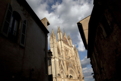 A view of the Duomo at sunset in Orvieto, Italy.