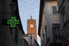 The clock tower at sunset in Orvieto, Italy.
