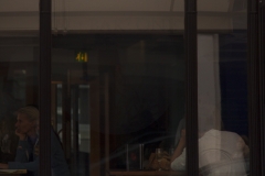 Two woman have drinks outside the All Bar One in Covent Garden, London, United Kingdom.